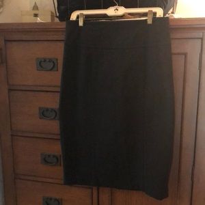 Magaschoni black pencil skirt spandex nylon size10 drop waistband 31” length 27”
